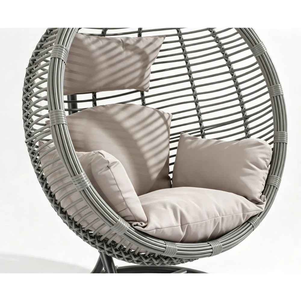 PE wicker hanging egg chair on a steel stand for covered patios and balconies