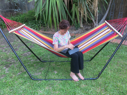 Single Red and White Canvas Hammock with Spreader Bar
