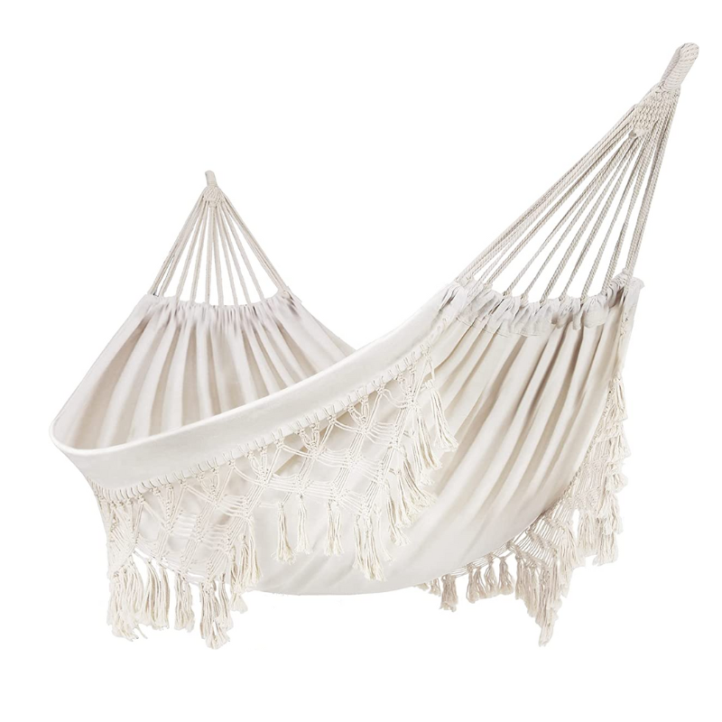 large white canvas hammock with tassels